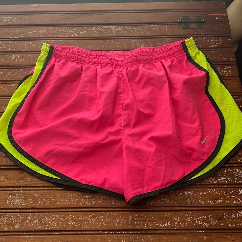 Neon pink and yellow Nike shorts